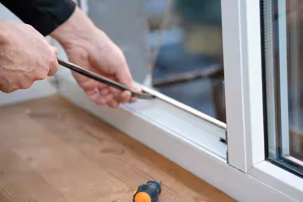 Technician performing same day glass door repair in Glenwood Springs