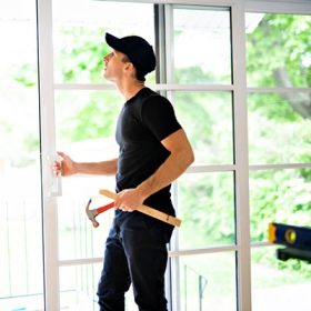 Professional technician providing door repair help in Glenwood Springs